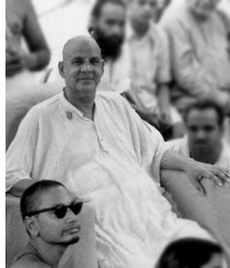 Sivananda and Swami Venkatesananda at his side.